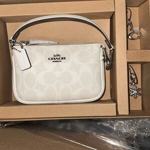 Coach Wristlet White/Chalk and Silver accents with two purse charms